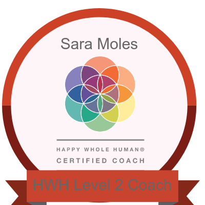 Certificate with a colorful flower-like design, bearing the name Sara Moles, indicating a Happy Whole Human Certified Coach HWH Level 2 Coach.