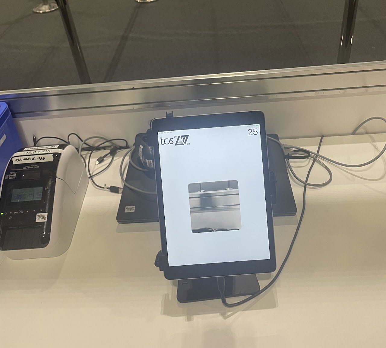 Box office point-of-sale setup used during a live event, supporting ticket sales and customer transactions.