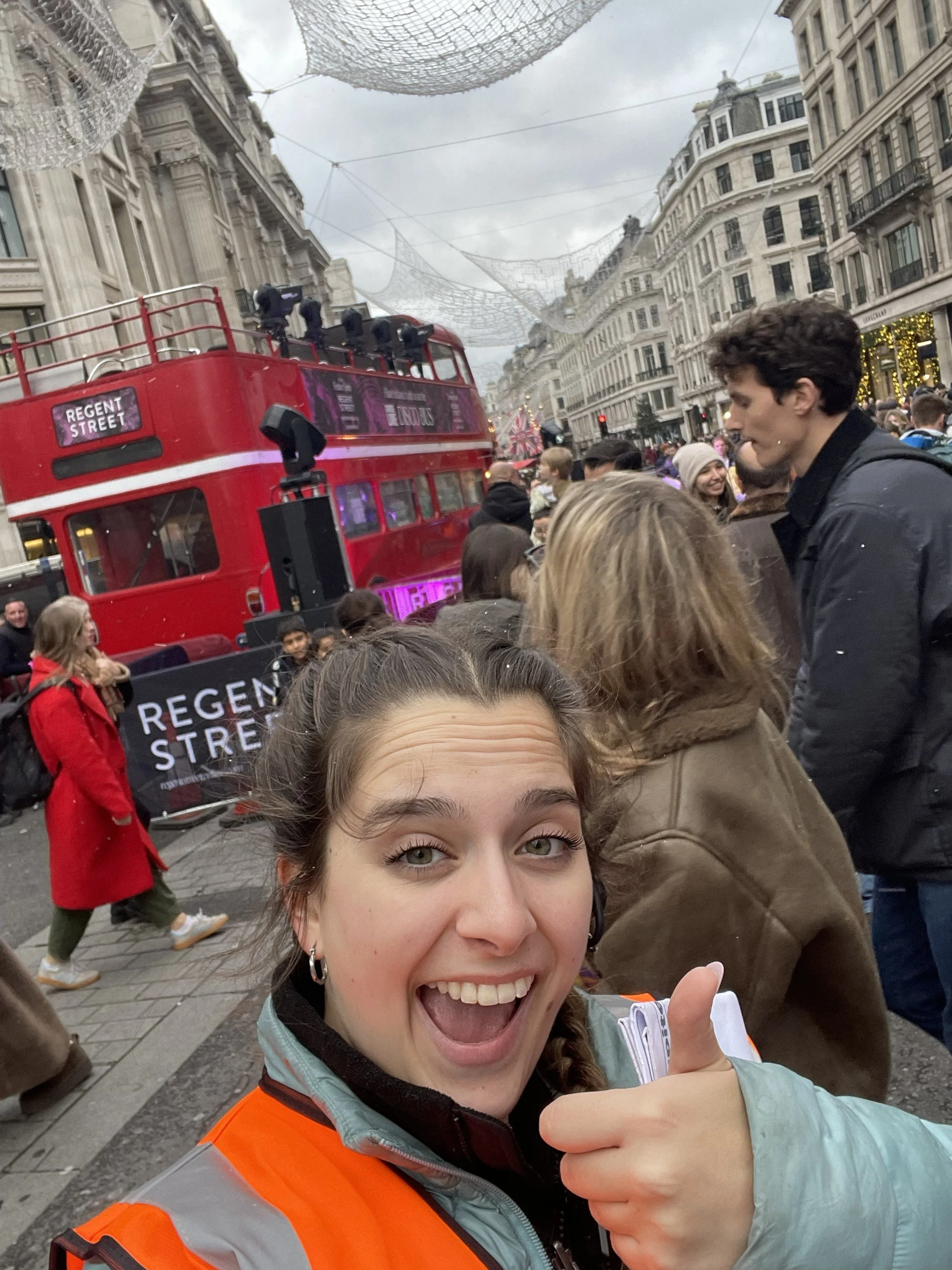 Event crew in front of red bus on Regent Street in London