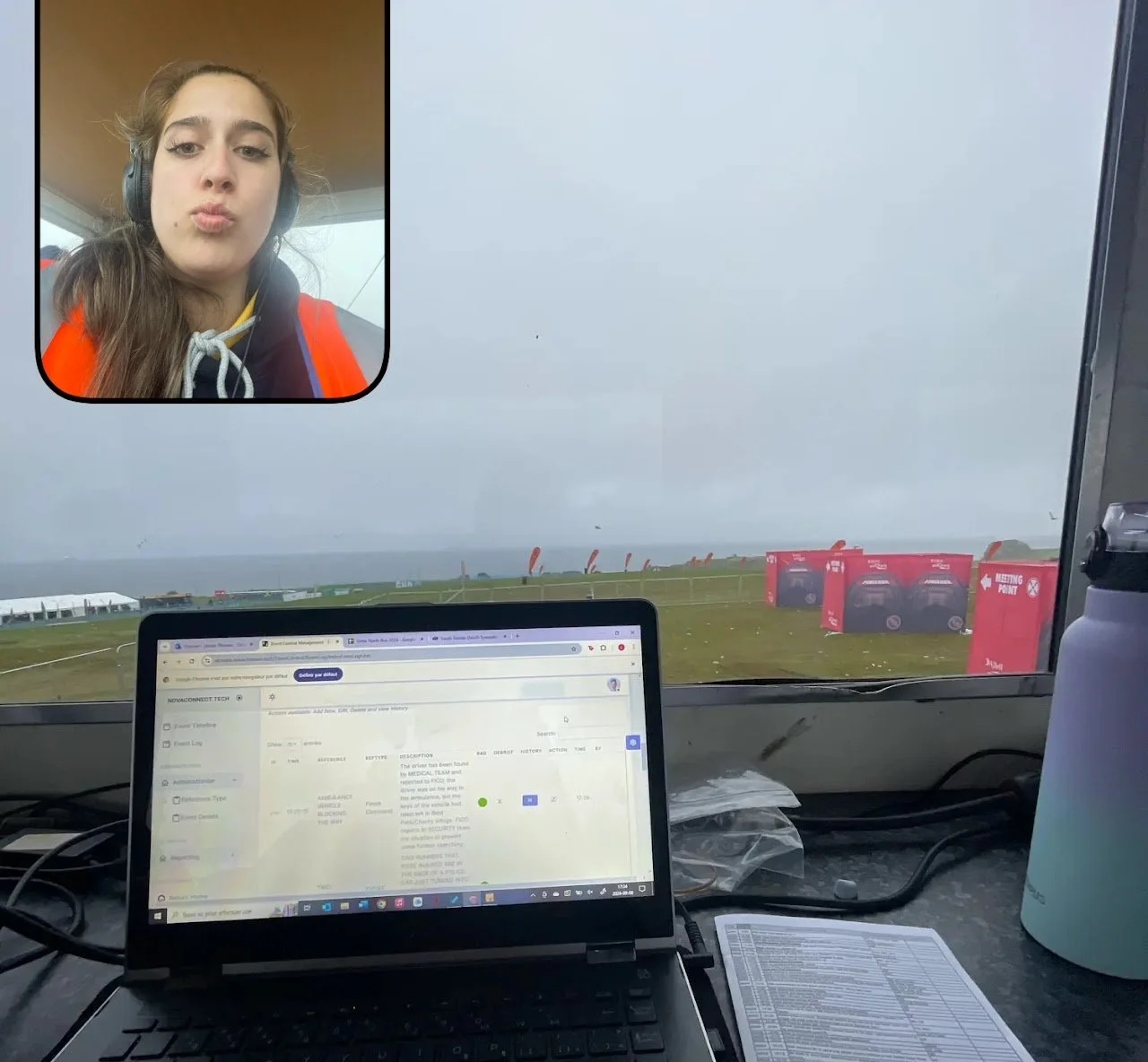 Working from event control on site, monitoring schedules and live information during an outdoor event.