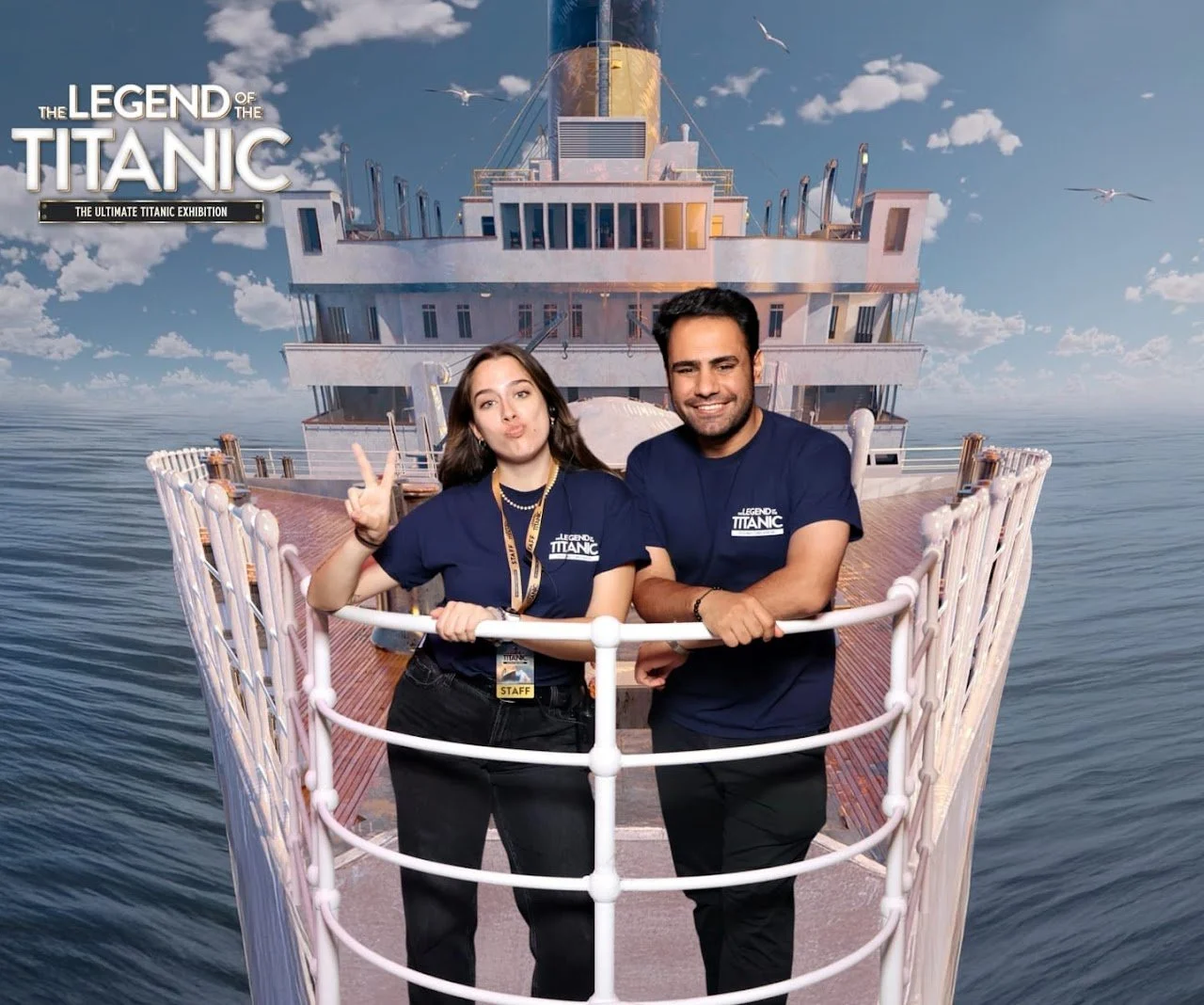 Event staff members posing together inside an immersive Titanic exhibition, representing front-of-house and visitor experience roles.