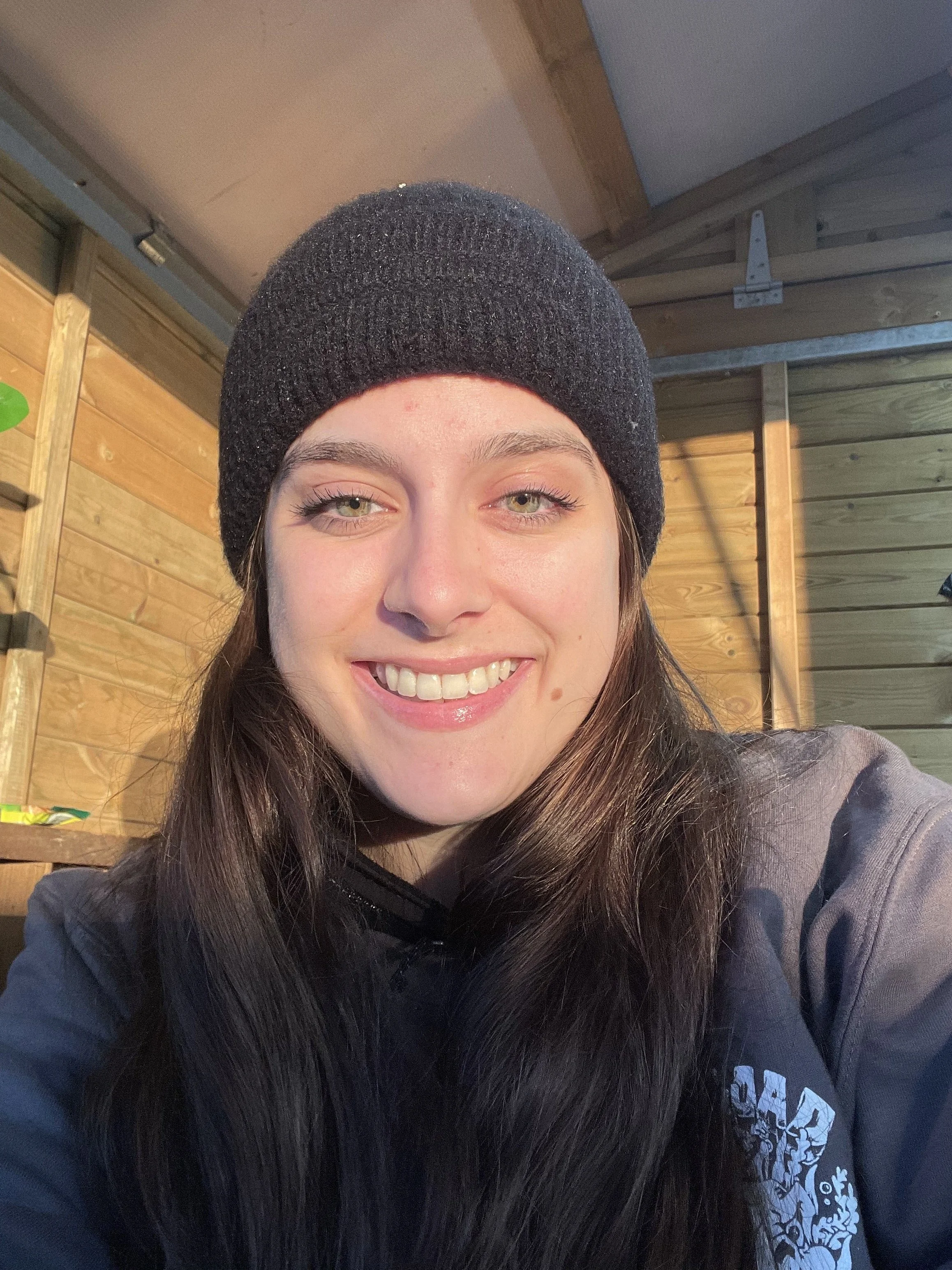 An event professional in the campsite cabin in the sunrise in the morning on the festival working on night shifts.