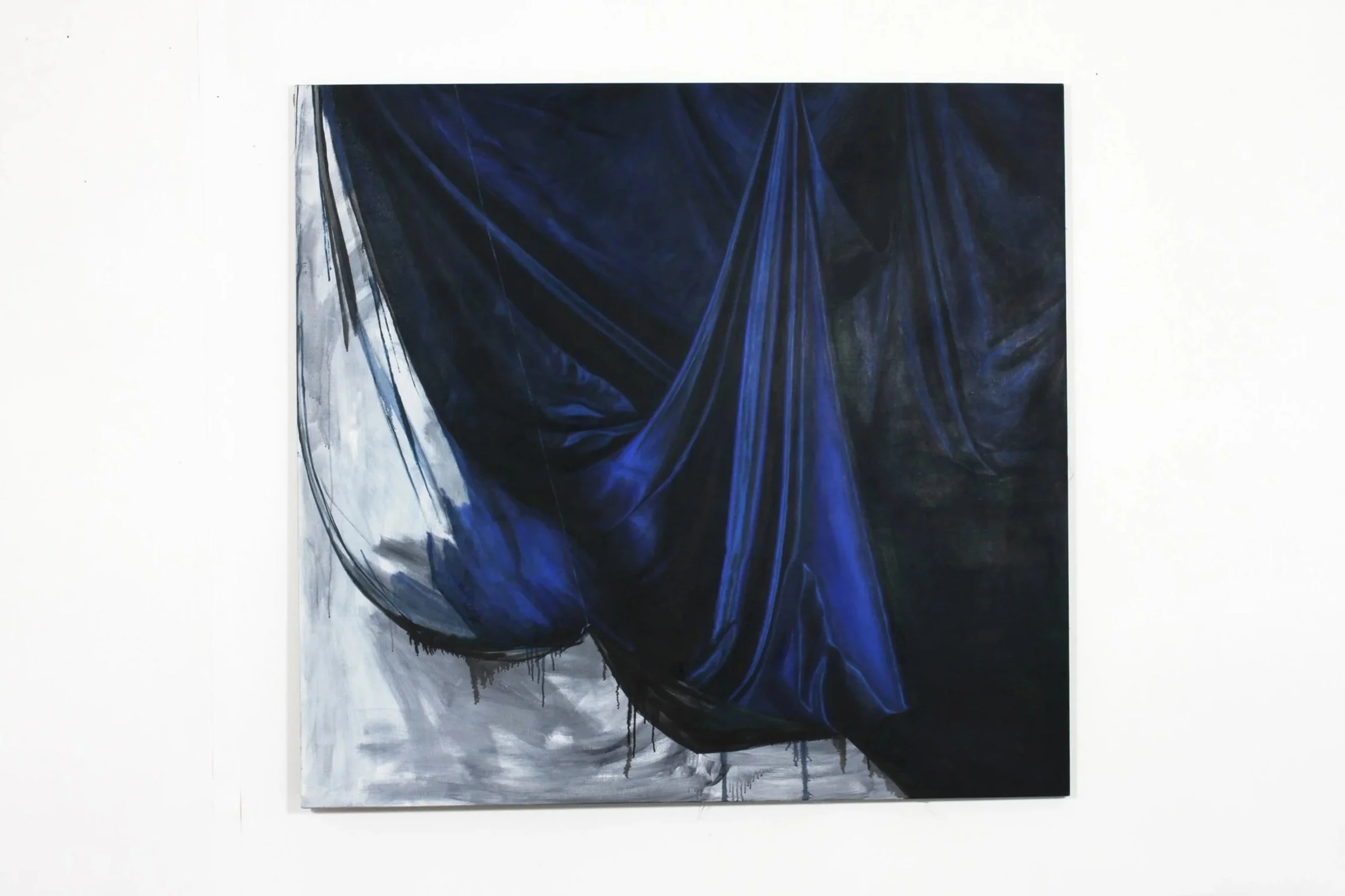 Abstract painting with dark blue, black, and white draped fabric-like patterns.