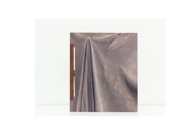 A painting of a fabric sheet draped over a rectangular surface, with part of a wooden frame visible on the left side.