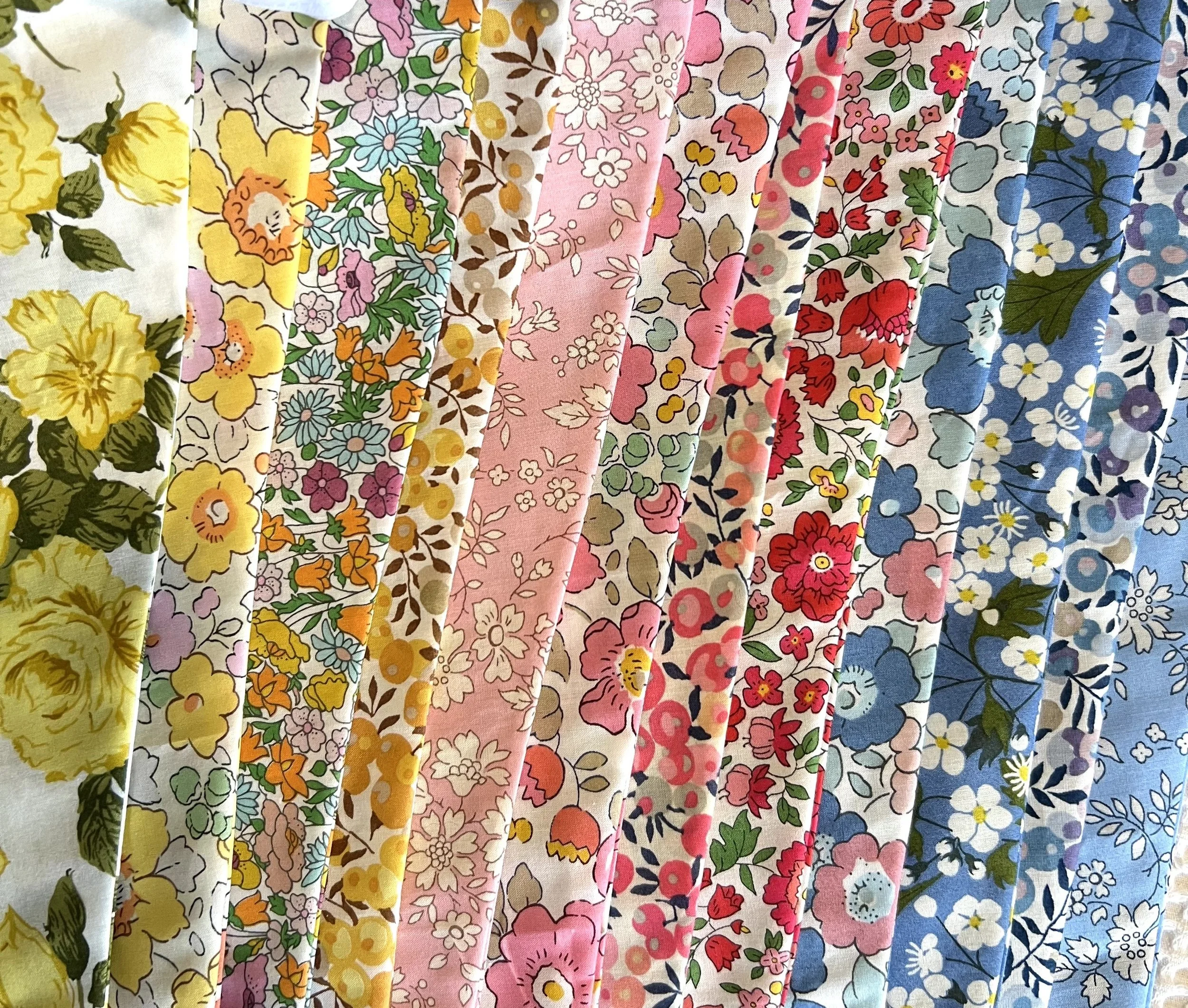 Rainbow bunting fabrics May 26 crop.jpeg