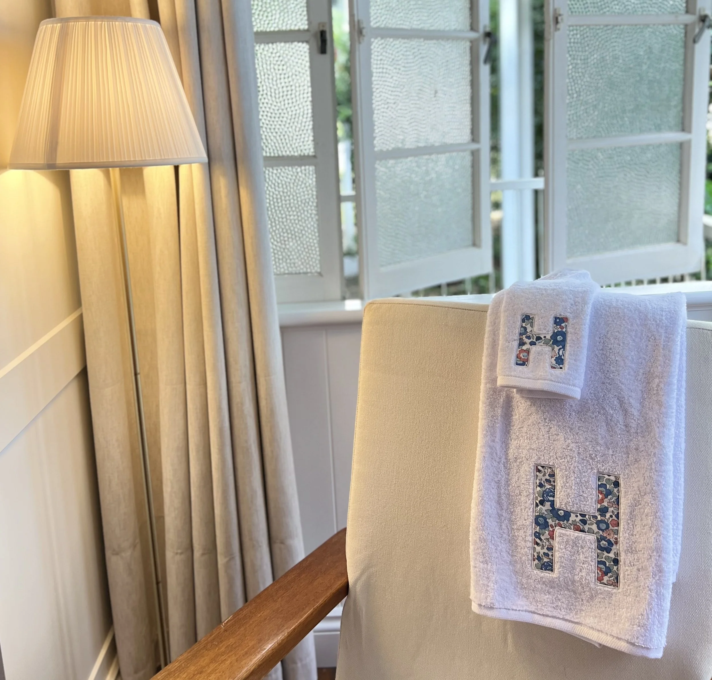 H Towel on chair betsy blue.jpeg