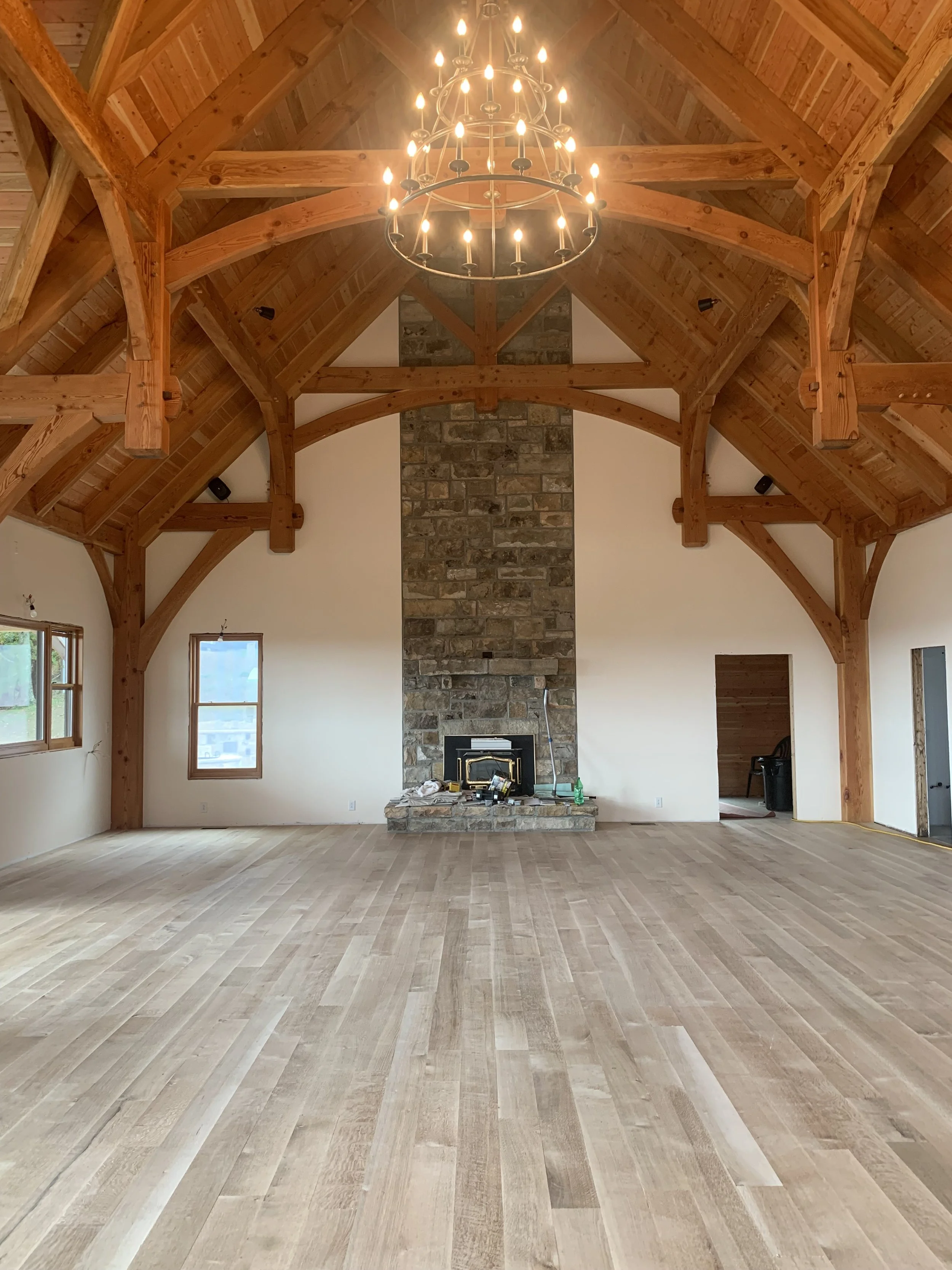 White oak hardwood flooring installation in a large custom home in Rainelle, West Virginia, by Goodman Custom Flooring.