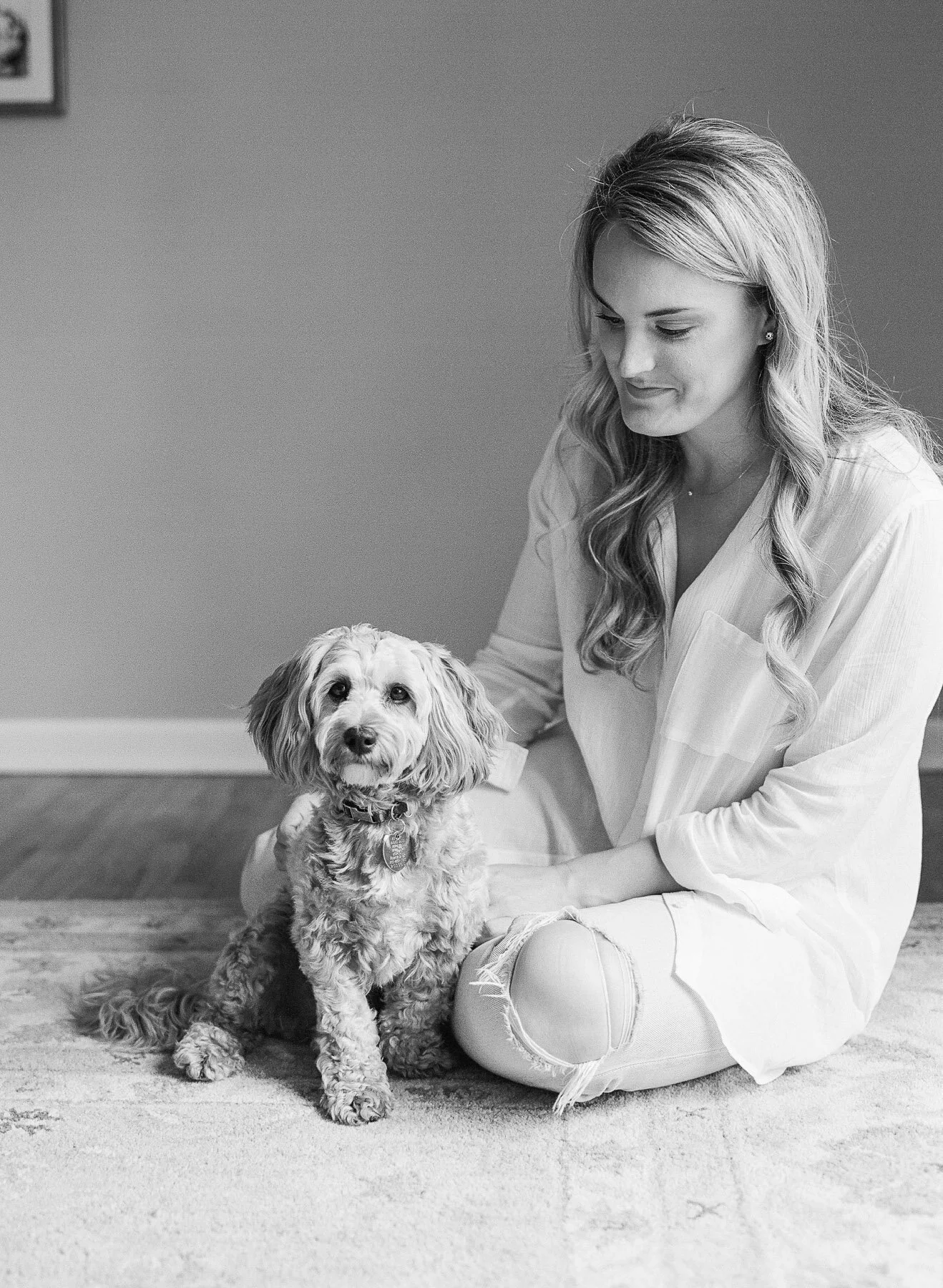 Bride and puppy on wedding day
