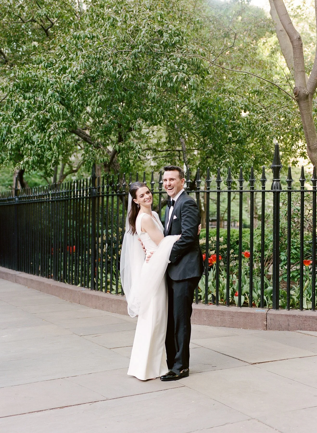 Gramercy Park wedding photos featuring Sarah Seven wedding dress and Tom James Tux