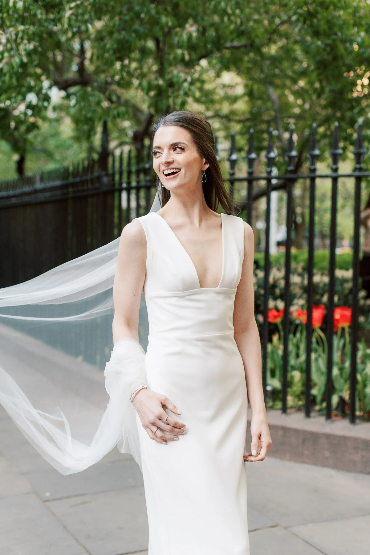 Gramercy Park wedding photos featuring Sarah Seven wedding dress and Tom James Tux
