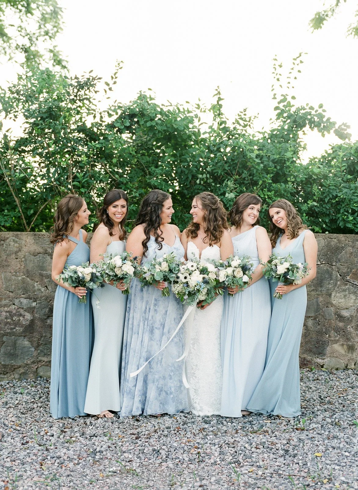 Blue bridesmaids in Jenny Yoo at Hotel du Village wedding in New Hope PA