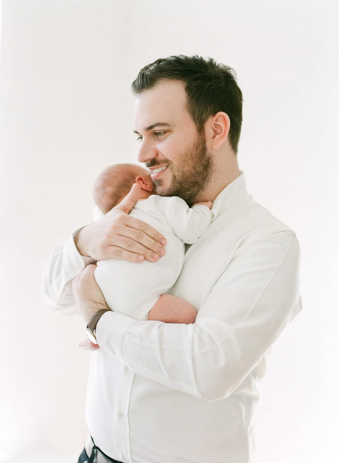Baby and Dad cuddling