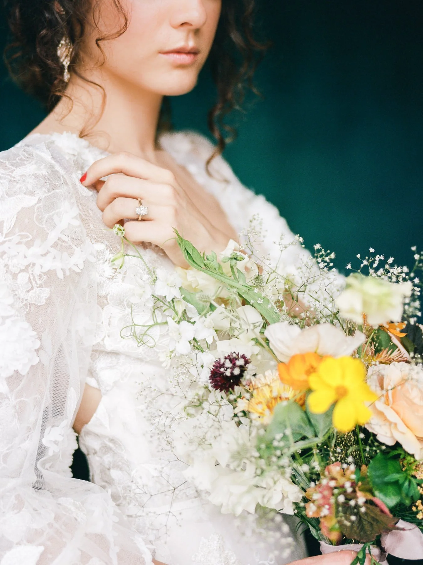 Baby's breath wedding bouquet and Marchesa wedding gown
