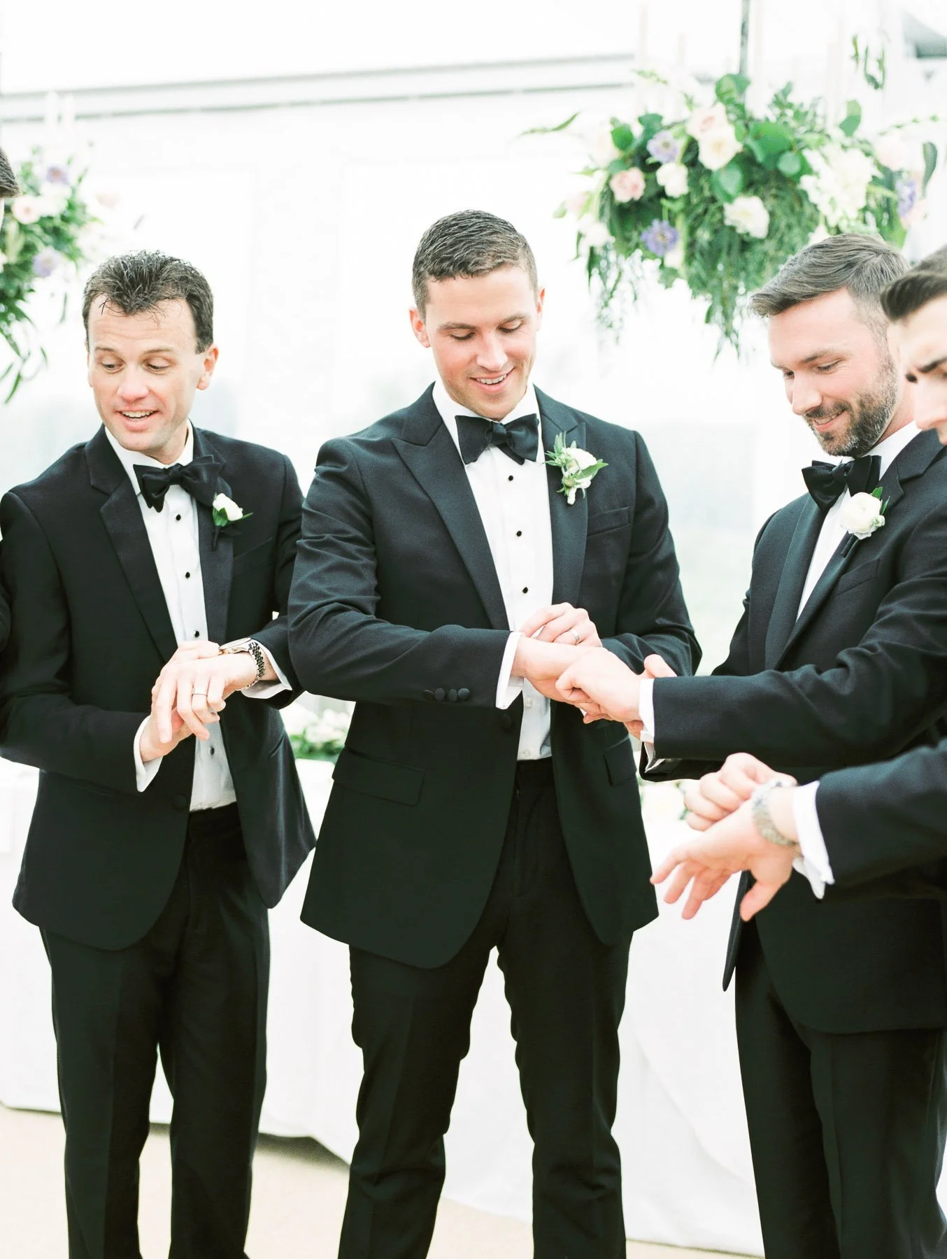 Groomsmen checking time