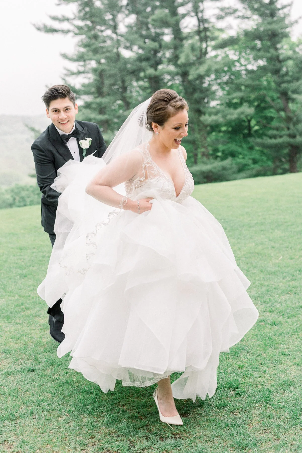 Bride and Groom Running from the Rain