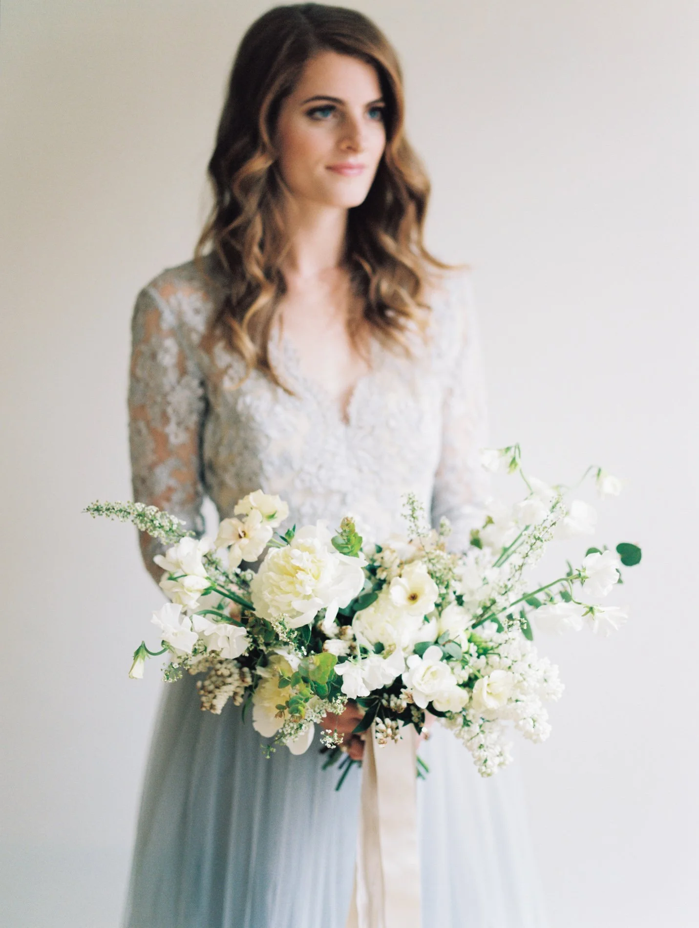 Alexandra Grecco blue wedding gown and Ava Flora bouquet