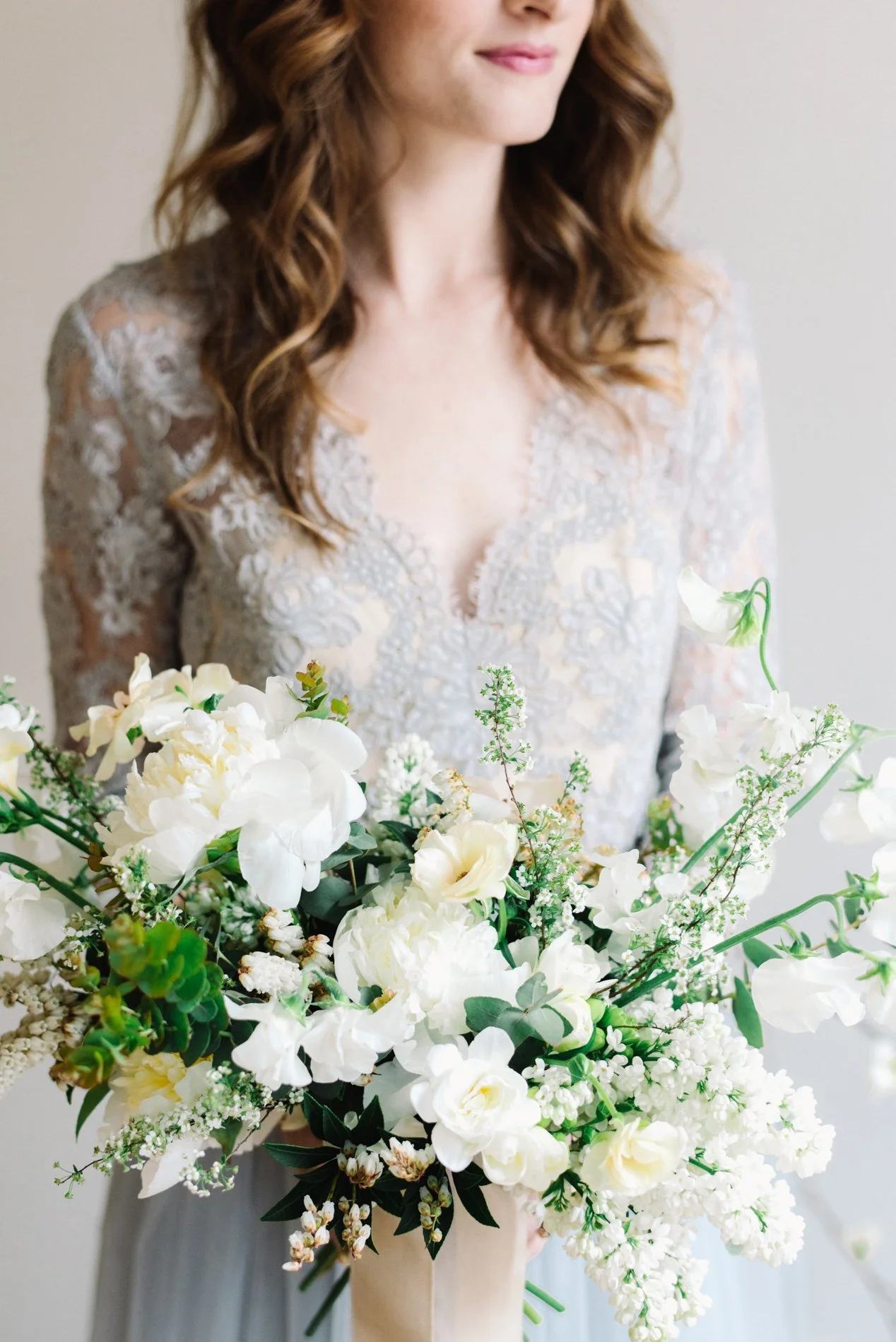 Alexandra Grecco blue wedding gown and Ava Flora bouquet