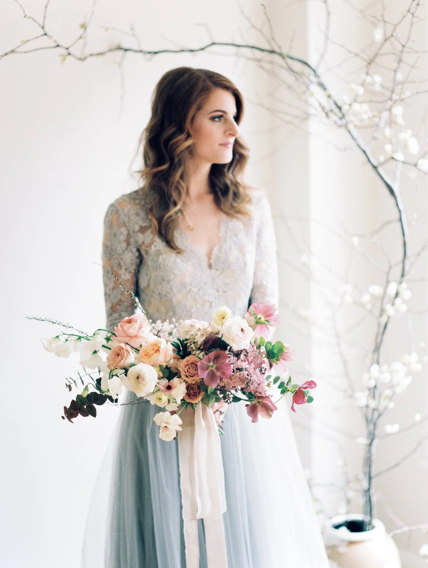 Alexandra Grecco blue wedding gown and Ava Flora bouquet