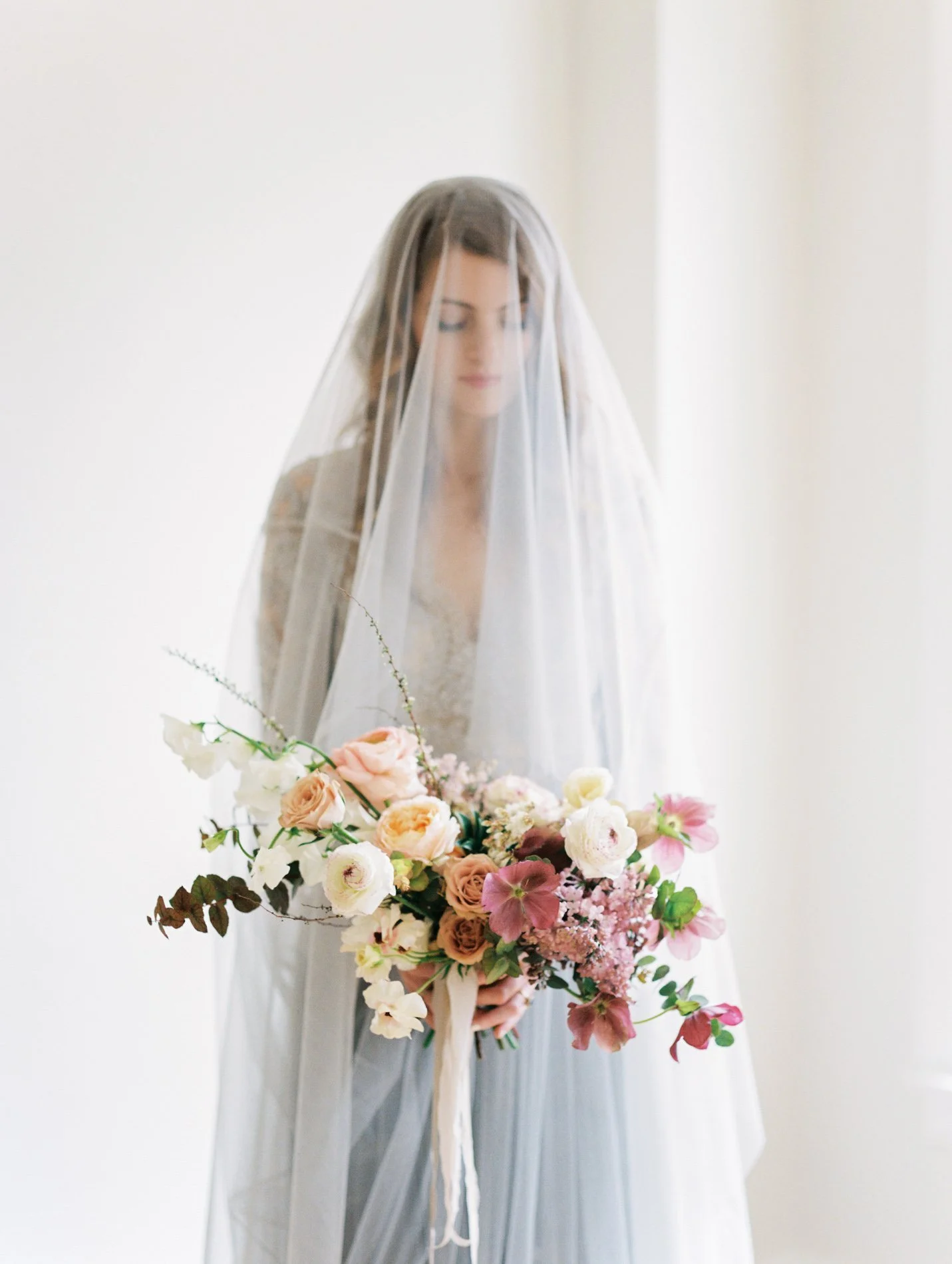 Alexandra Grecco blue wedding gown and Ava Flora bouquet