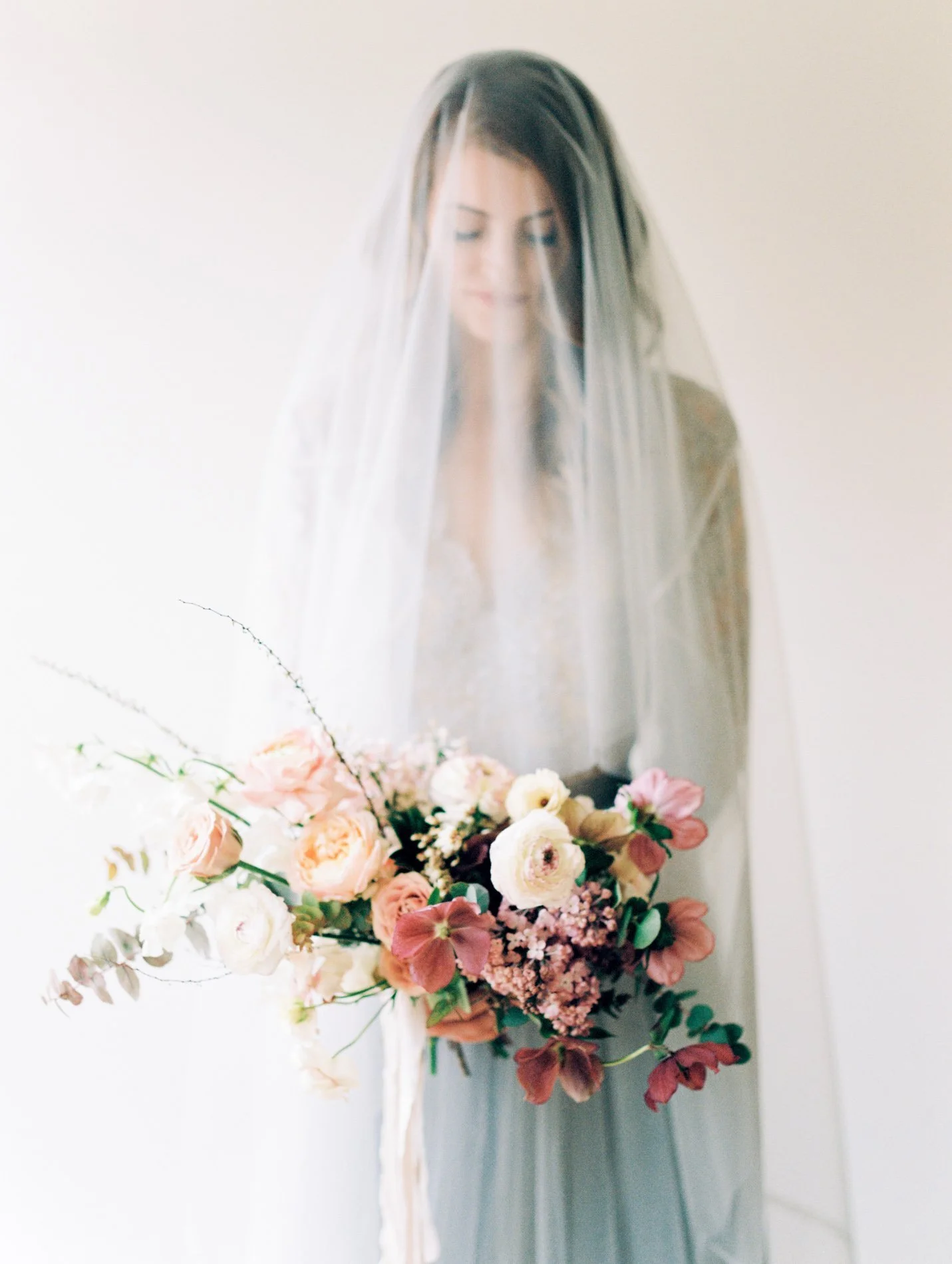 Alexandra Grecco blue wedding gown and Ava Flora bouquet