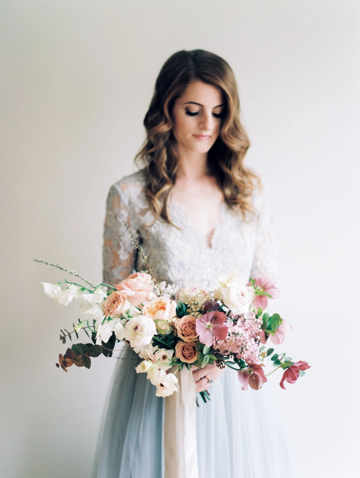 Alexandra Grecco blue wedding gown and Ava Flora bouquet