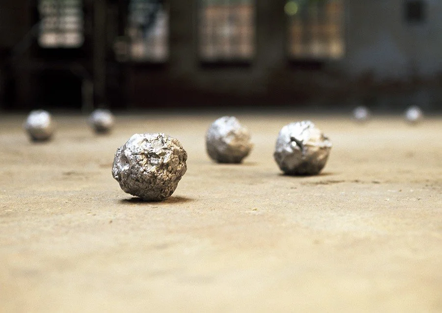 21 Balls of Clay Dug from a Field in Ireland, 2000