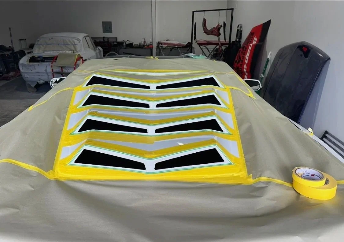 Precision hand laid masking and layout work for a custom Corvette C7 paint design.
Every line is measured by eye 
in preparation of accent color.

