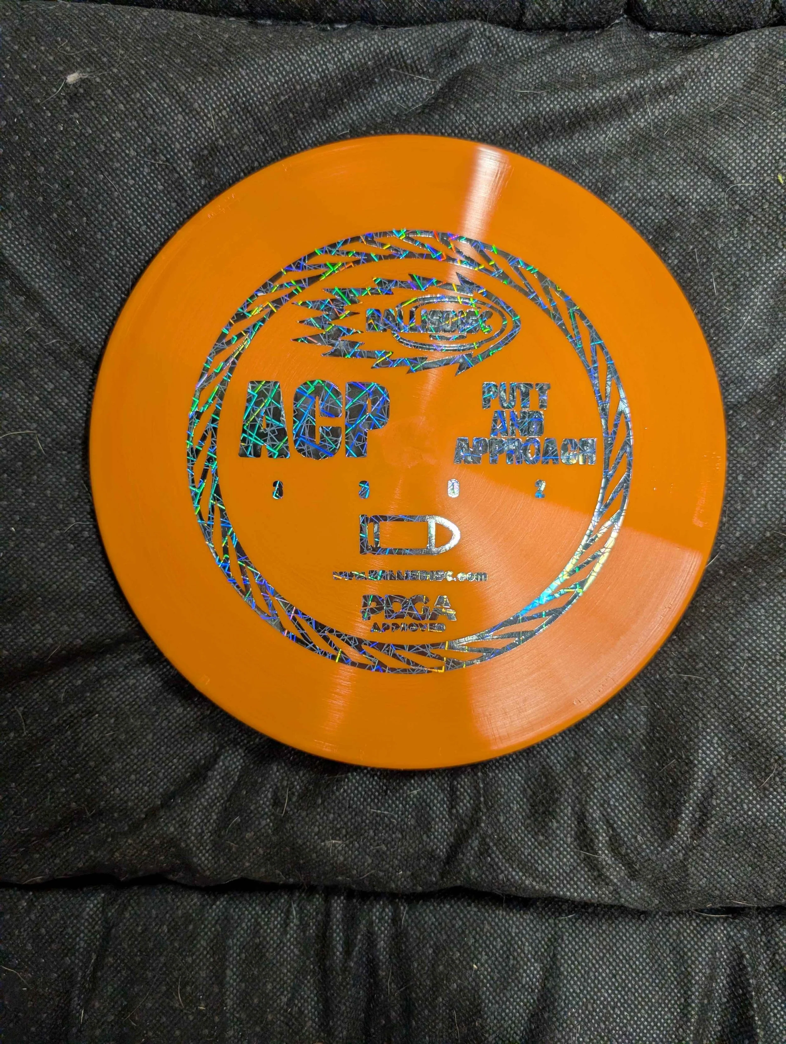 orange disc holo stamp.jpg