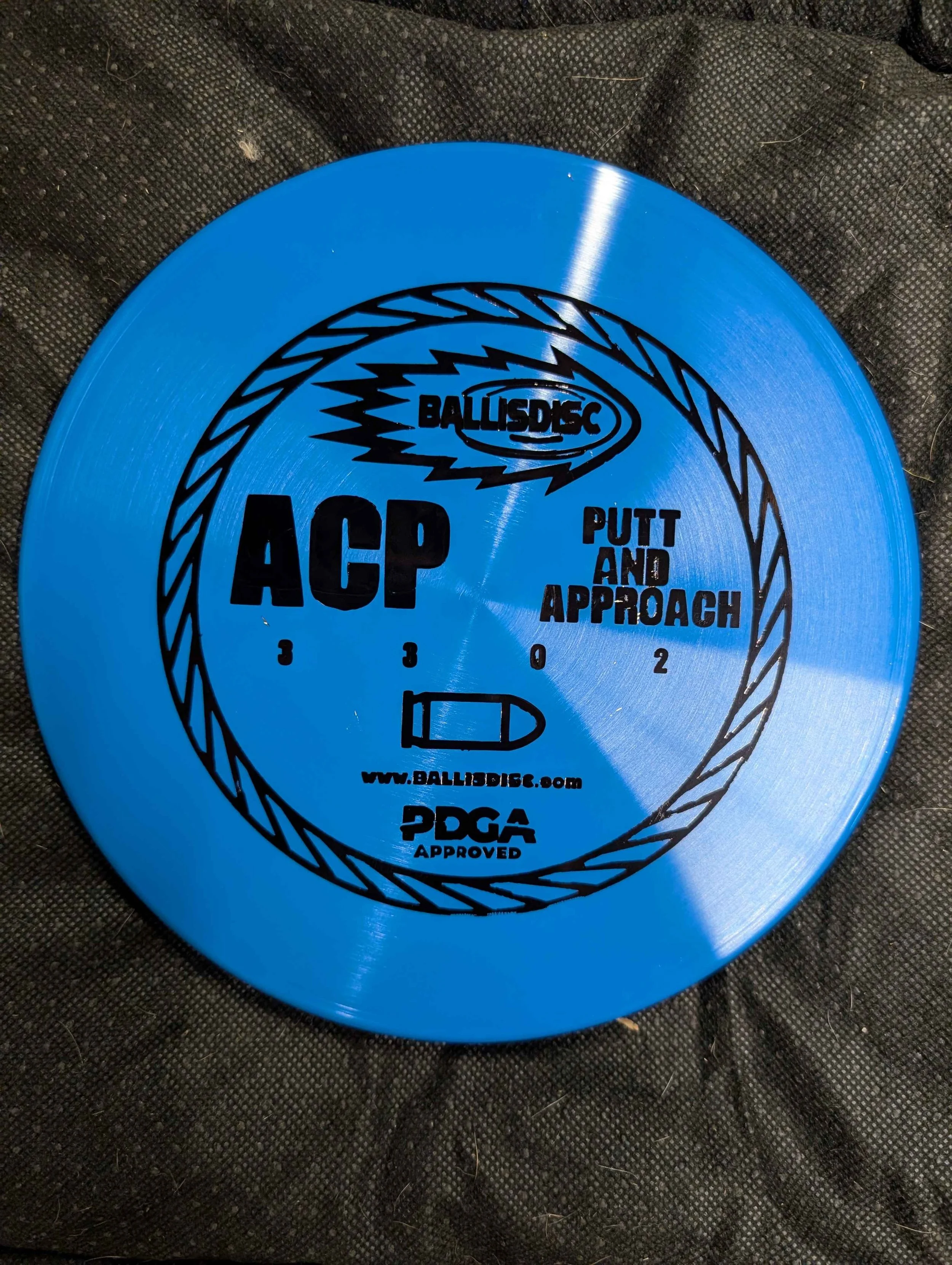 blue disc black stamp.jpg