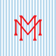 Red letter M stylized with vertical lines, set against a blue and white striped background.