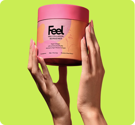 Two hands holding a pink container of Feel Pro Collagen Reimagined against a bright green background.