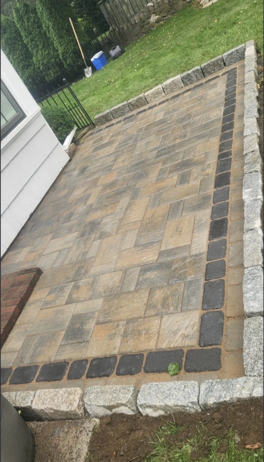 Paver landing with cobblestone border - Concord NH