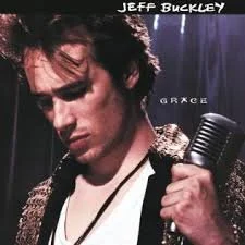 Closing shot of Jeff Buckley's album cover with his name and title, featuring Buckley holding a microphone with a serious expression.