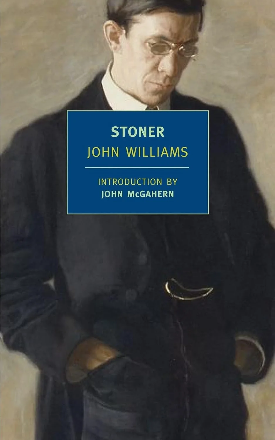 Book cover featuring a man wearing sunglasses and a black jacket with a blue title box that reads "STONER JOHN WILLIAMS INTRODUCTION BY JOHN McGAHERN".