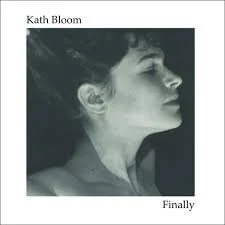 Black and white portrait of a woman with short hair in profile, looking upwards, with the words 'Kath Bloom' and 'Finally' written on the image.