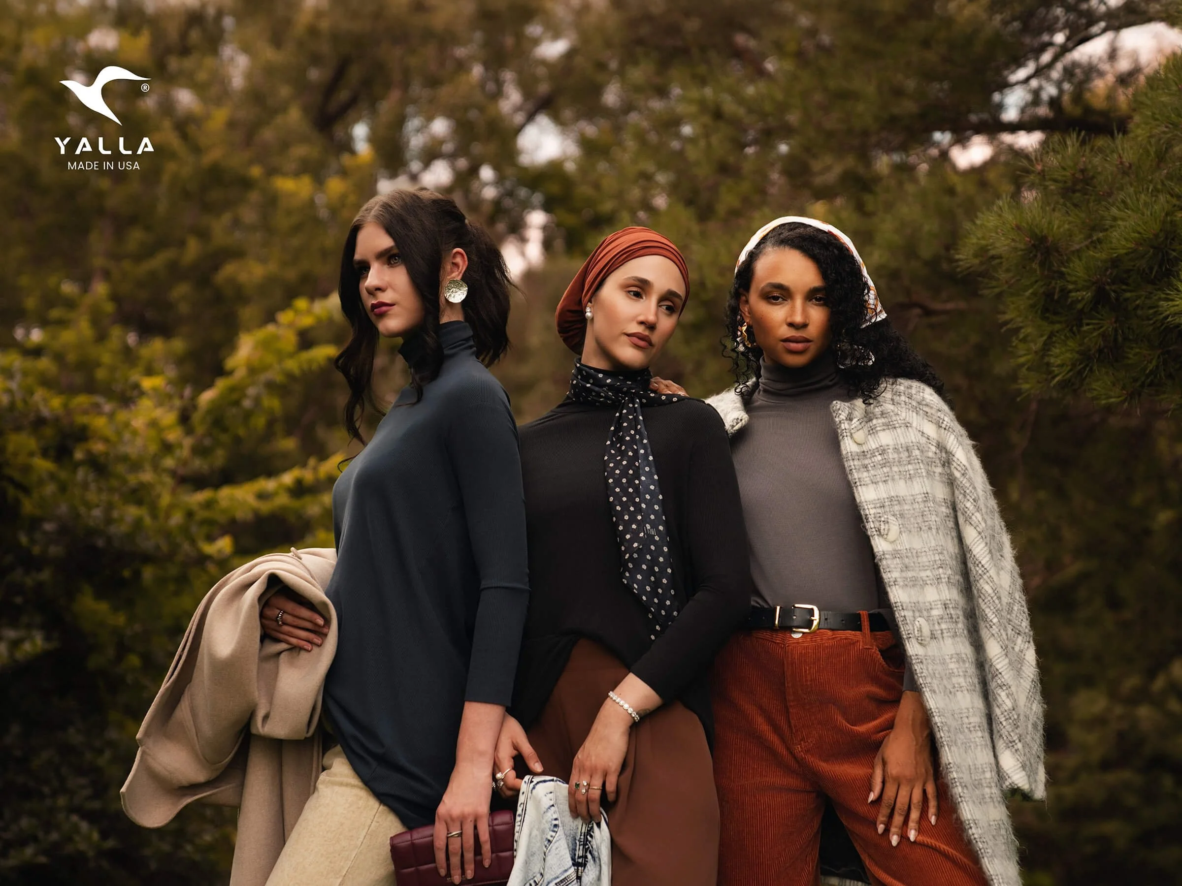 (three women outdoors in fall clothing) Yalla Wear Apparel. Top commercial photographer Minneapolis - fall fashion campaign - Krizia Studios