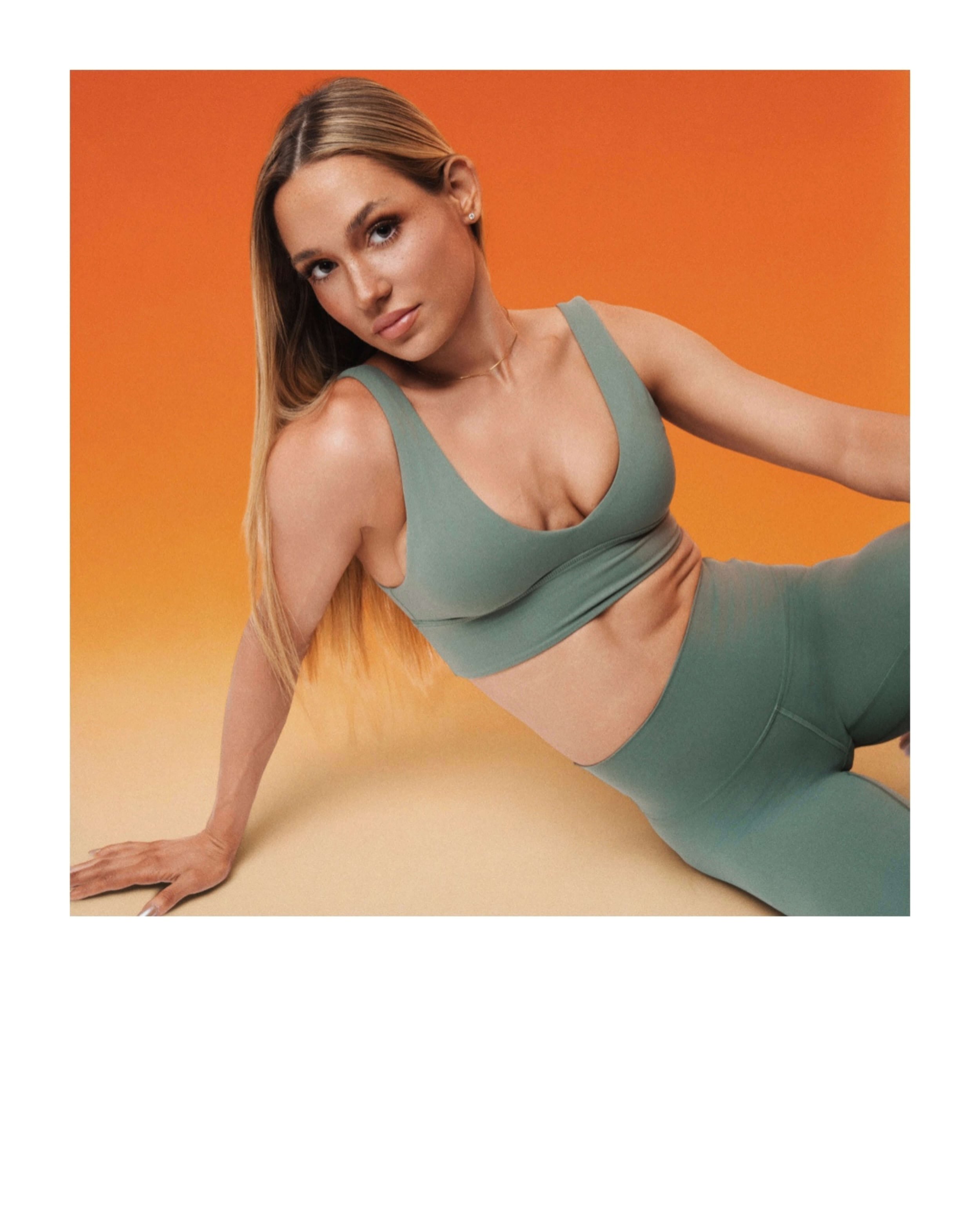 Lululemon spec campaign featuring athletic wear in a studio setting with bold color backdrop