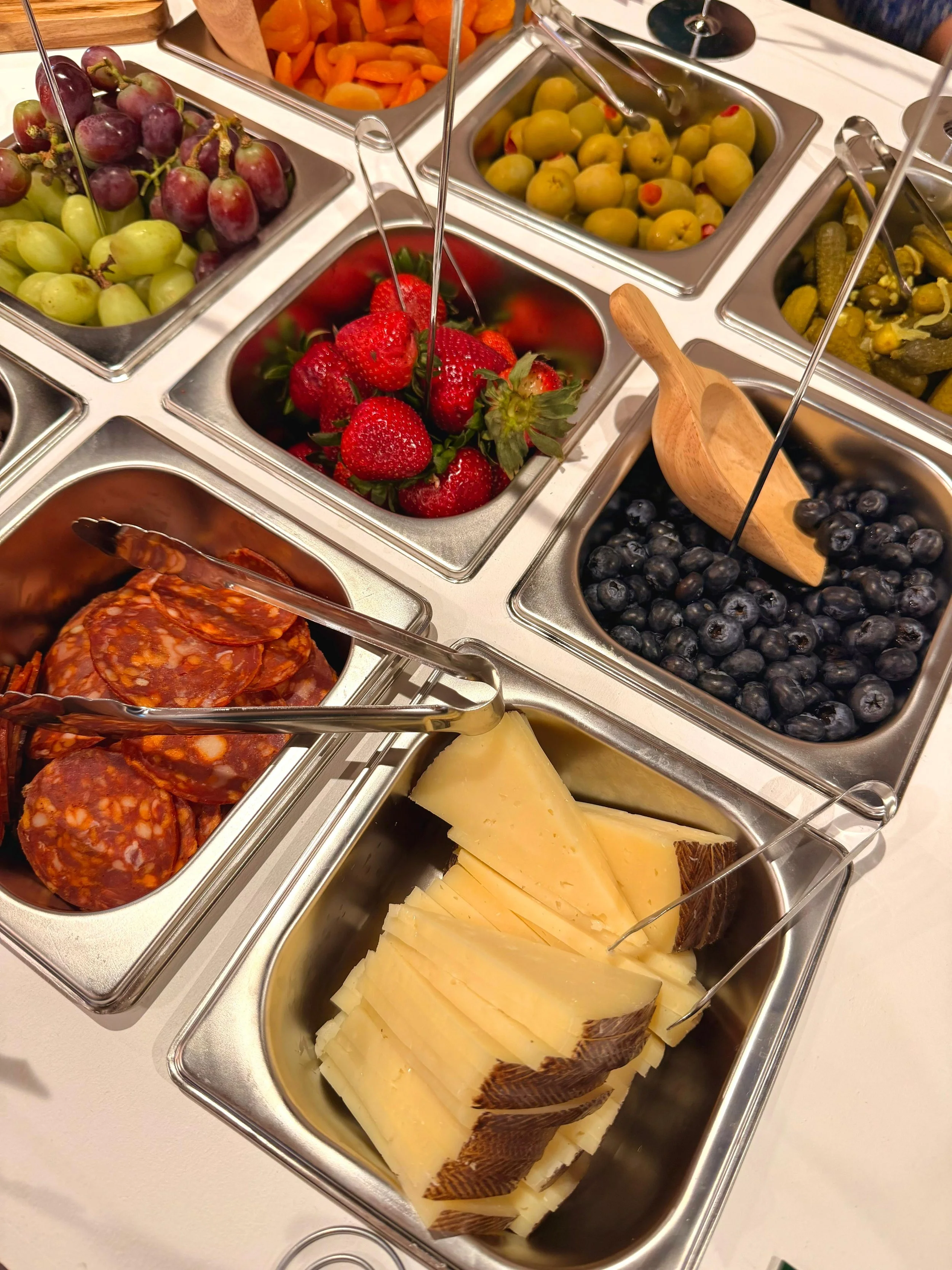 Mobile charcuterie cart with meats cheeses and fresh fruit Midland TX