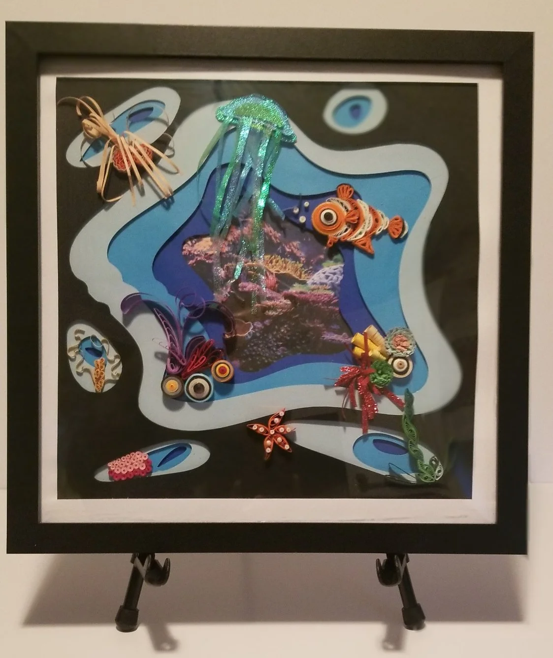 PAPER:    
Quilling * Layered Pictures * Folios * Cards * Custom Gift Card Holders * Invitations * Ornaments * Specialty Boxes * Etc.