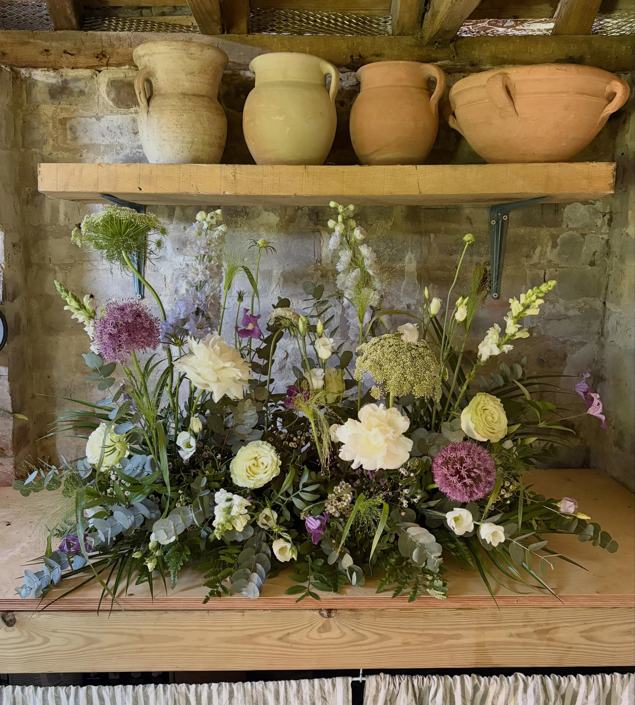 Looking to make the most of your floral budget?

At The Hastings Flower Company, we love creating designs that have maximum impact while working hard throughout your wedding day. By thoughtfully planning your flowers, arrangements can be repurposed f