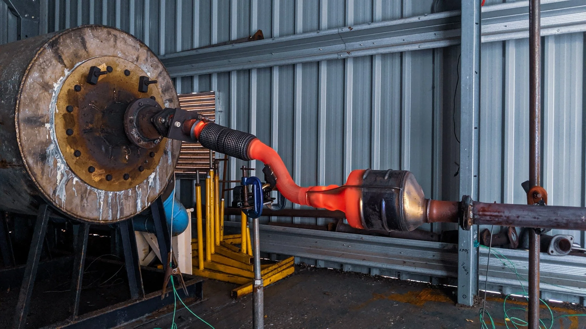 High-temperature exhaust testing facility with specialist pipework and test equipment.