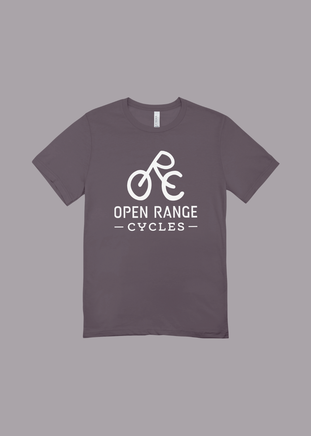 Gray T-shirt with white logo and text that reads "Open Range Cycles" and an abstract bicycle symbol on the front.