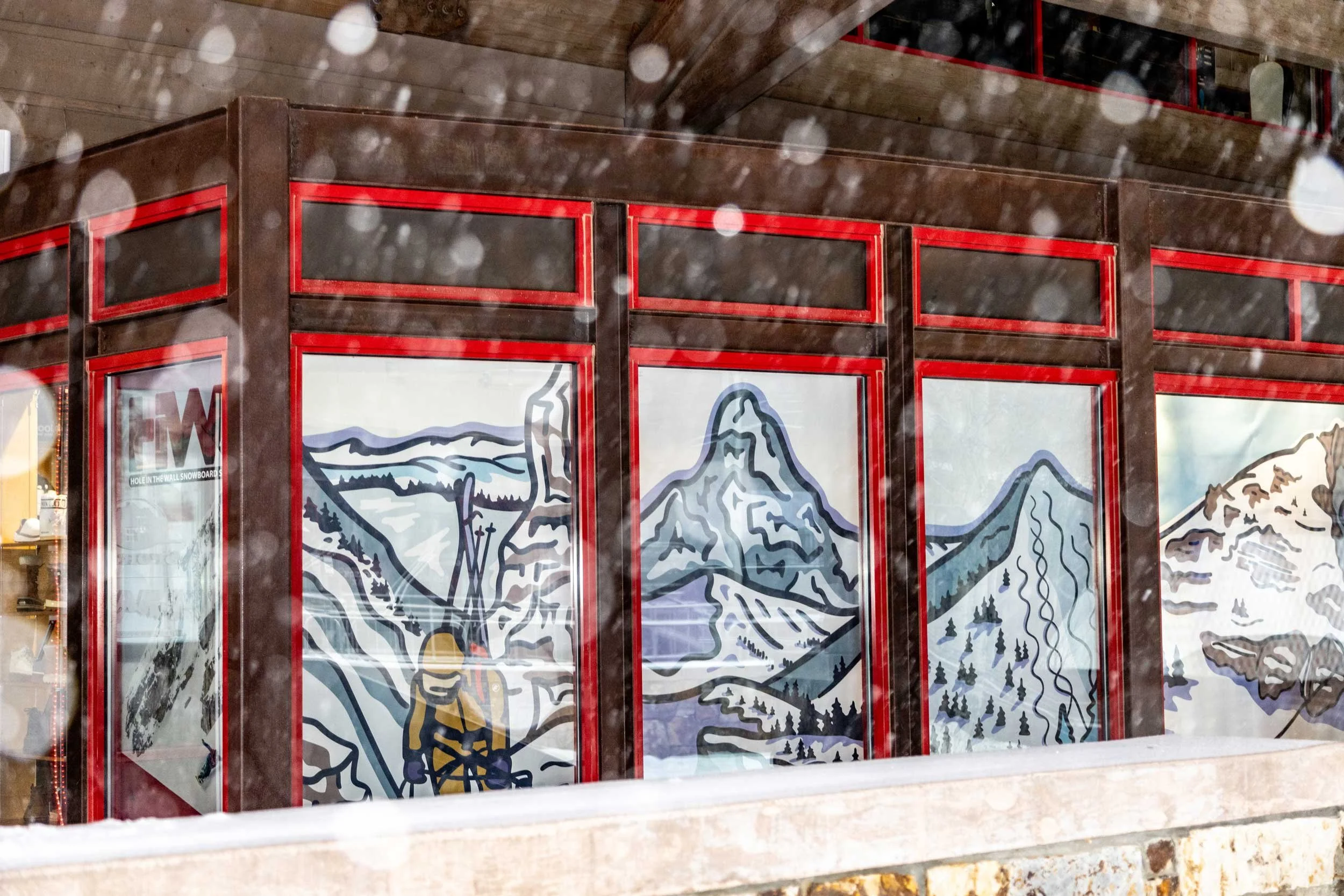 Side panels showing Teton backcountry skiing, art by Kia Tolan.