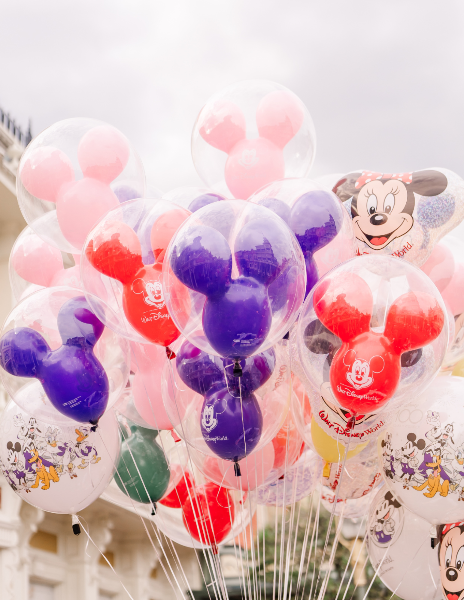 Family visiting Cinderella Castle at Walt Disney World during a theme park vacation