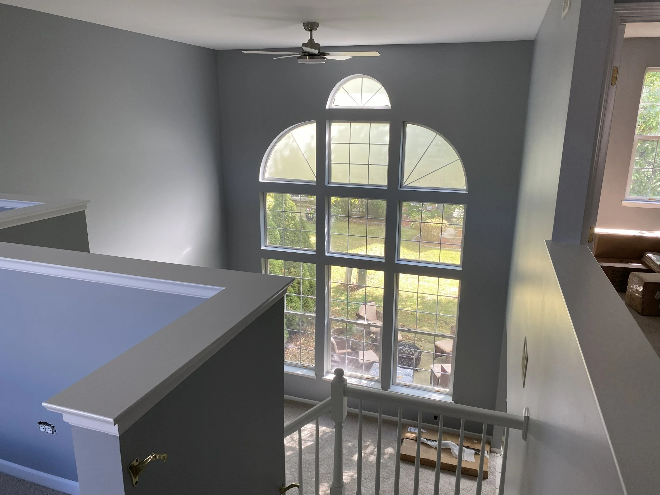 Oranssi technician working on a roof project