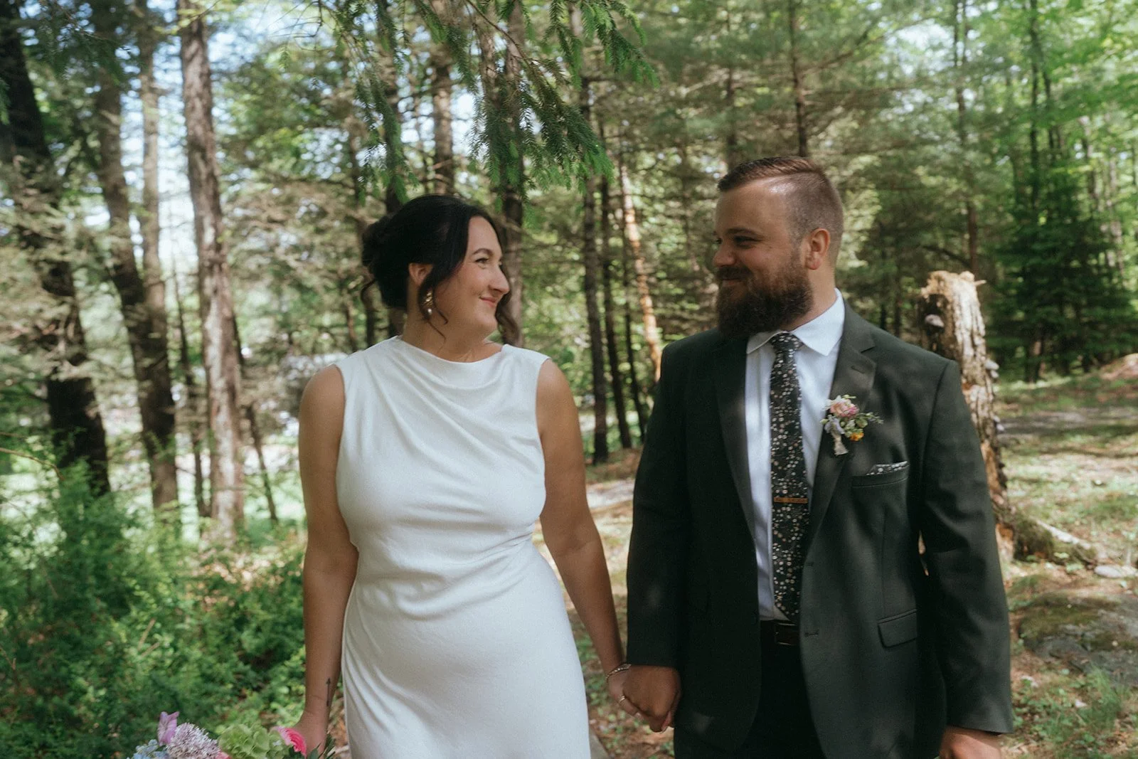 Laurie’s customers, Larissa and Emmett, just married walking off the aisle together.