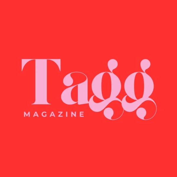 Logo of Tago Magazine with a red background and pink text.