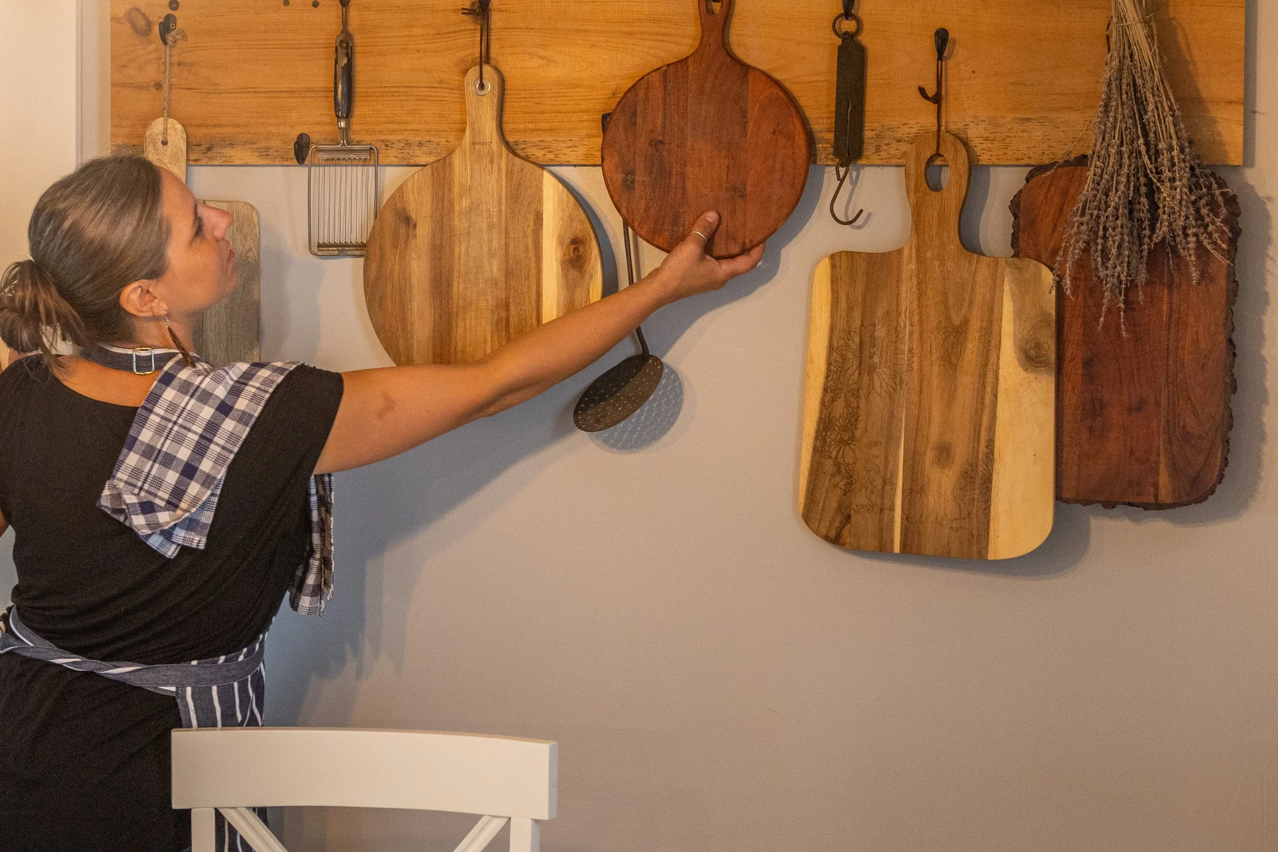 lana and cutting boards.jpg
