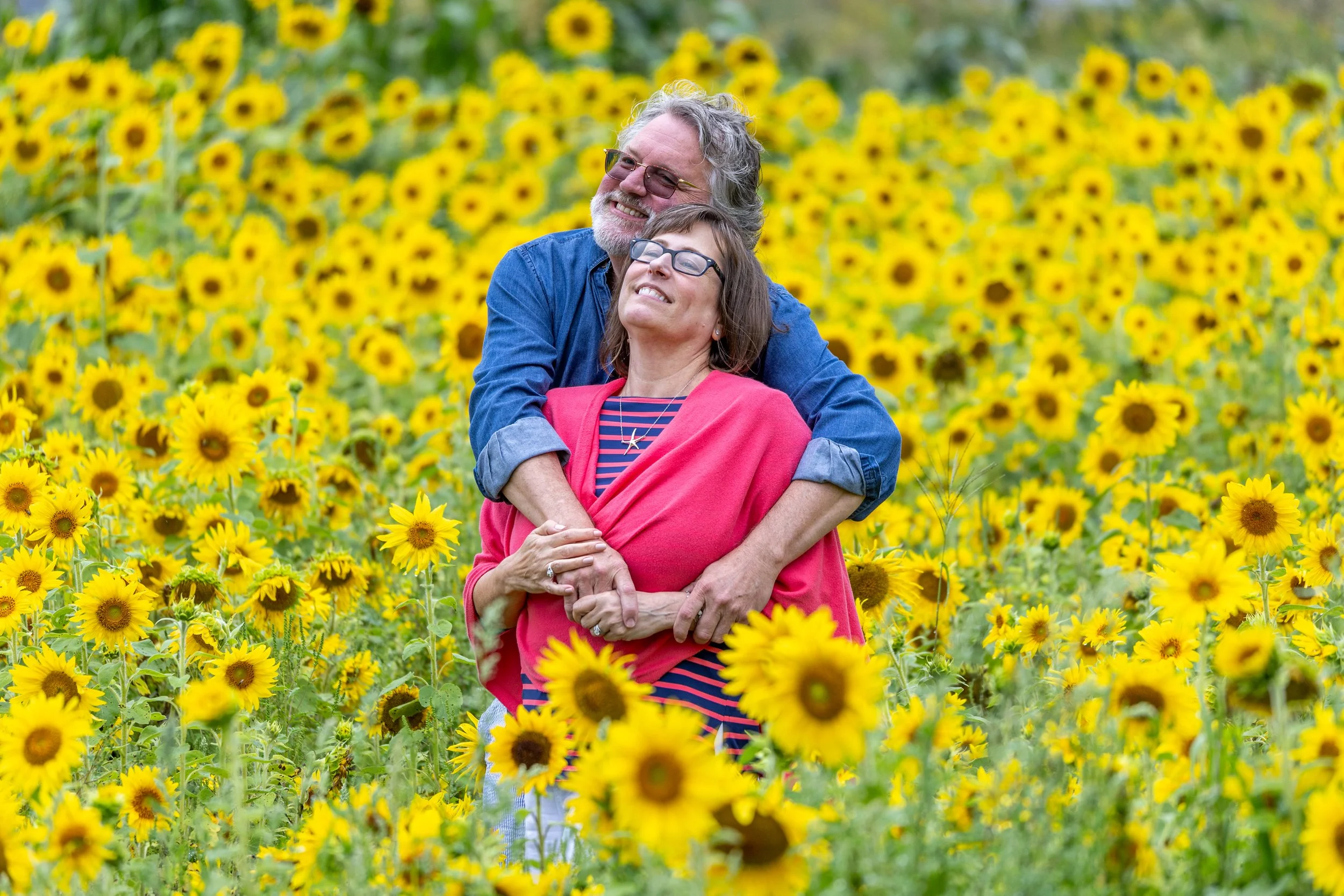 jill and ben in flowers.jpg