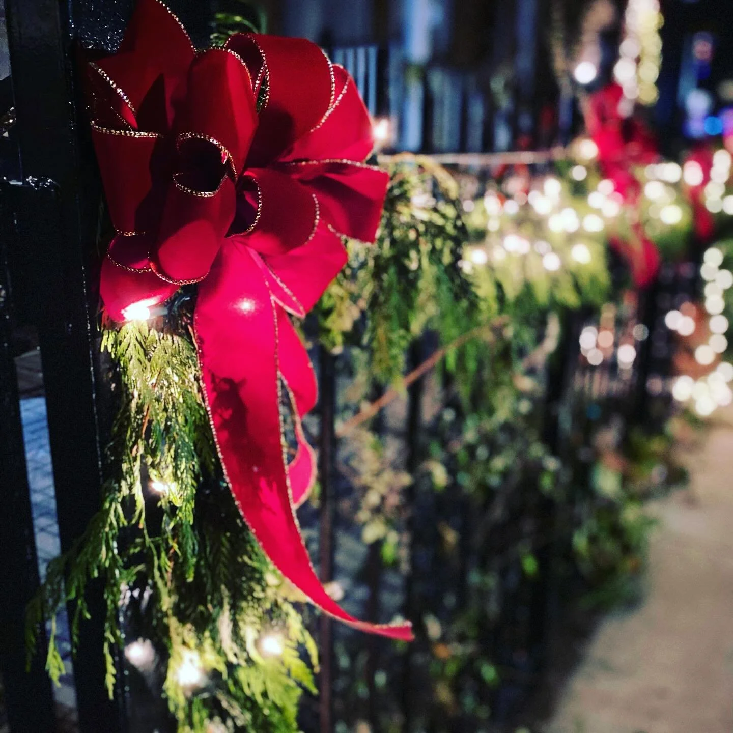 Serenade of Festive Charm: Evergreen garlands adorned with vibrant red bows, spreading joy and merriment everywhere! 🎄❤️✨ 

#HolidayMagic #DeckTheHalls #FestiveVibes #redfernholiday #redfernholidaydecor #chicagoholidays #holidaydecorating #followthe